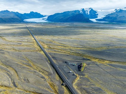 Aerial view of the Skeidara Bridge Monument viewpoint, large metal parts of the bridge that was