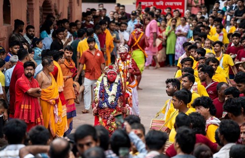GUWAHATI, INDIA, AUGUST 19: Priests dance in the beat of Dhol (Drum) during the annual