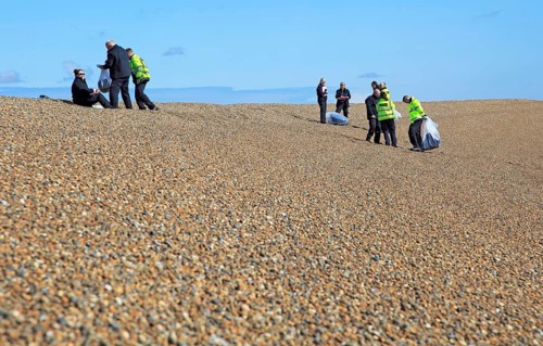Border Force staff conduct training exercise on beach at Shingle Street, Suffolk, England, UK
