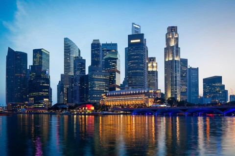 Singapore skyline and Marina Bay in evening
