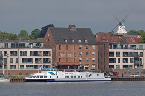 View of the harbour from the garden of the youth hostel, excursion boat, houses, Amanda windmill,