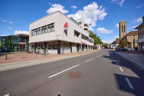 Sparkasse Vest Branch Datteln and Luther Church in the city centre of Datteln, Ruhr area,