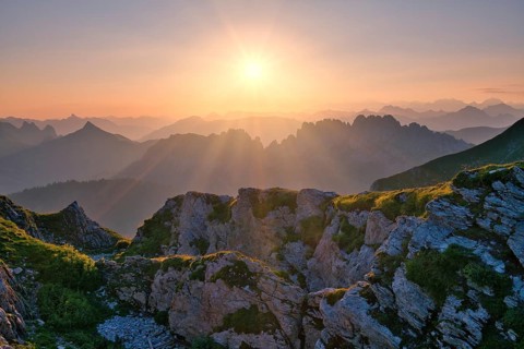 Fribourg Prealps with Gastlosen mountain range at sunrise, Bernese Alps behind, cantons of Fribourg