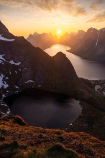 View from the mountain Reinebringen to the lake Reinevatnet and the Reinefjord with other mountains