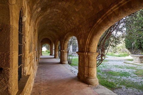 Monastery of Our Lady of Mount Filerimos, Historic stone portico with views of the surrounding