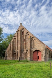 13th century Gothic monastic tithe barn of the Ter Doest Abbey at Lissewege near Bruges, West