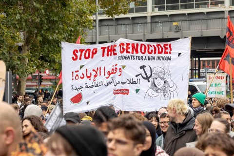 Banner Stop the Genocide! Students for a new Intifada at the pro-Palestinian demonstration in