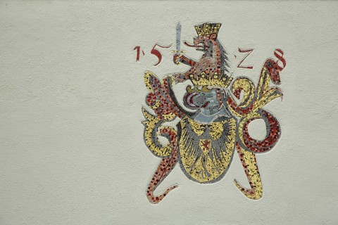 Town coat of arms with the year 1528, wall mosaic, heraldic animal, eagle figure, lion figure,