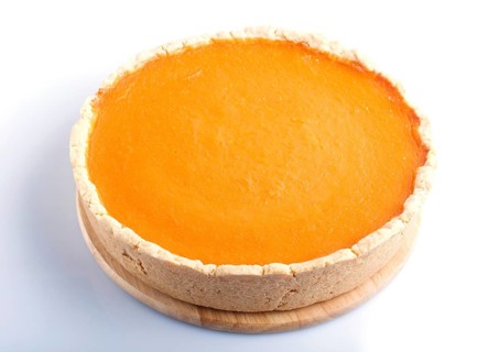 Traditional american sweet pumpkin pie isolated on white background. close up