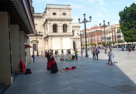 Women flamenco dancers street busking in central Seville, Spain, Europe
