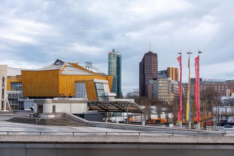 View of Potsdamer Platz with Deutsche Bank headquarters, futuristic Berlin Philharmonic building in