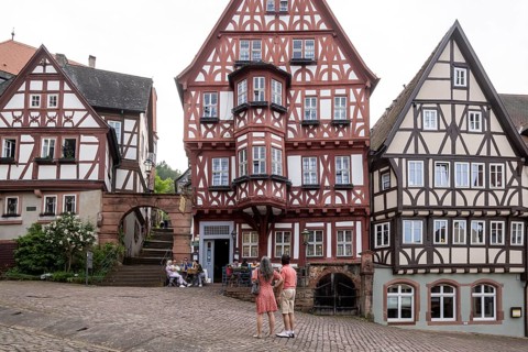 Miltenberg market square with magnificent half-timbered houses, Schnatterloch. The ensemble is one