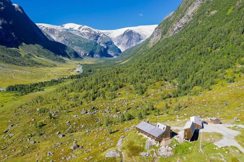 Aerial view of tourist cabin Tungestølen at the glacier Jostedalsbreen, valley Langedalen in the