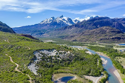 Aerial view over river Rio Tranquilo to mountain range of San Lorenzo, south of Cochrane, road