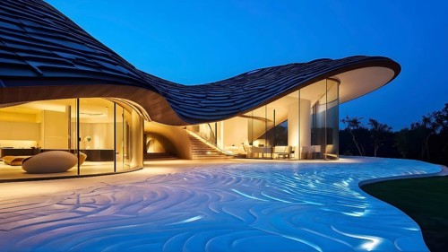 Modern art museum architecture inspired by seashells spiral patterns, AI generated