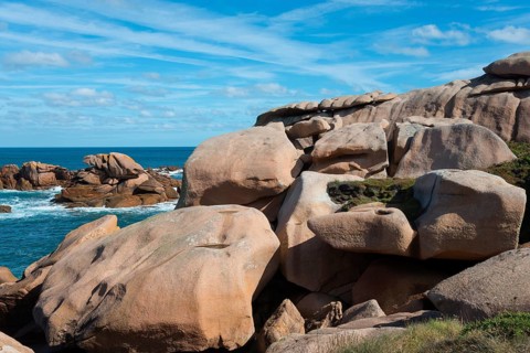 Rock formations on a coastline under a blue sky, Ploumanac'h, Ploumanach, Perros-Guirec,