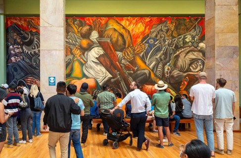 People viewing 'Katharsis' 1934 mural by Jose Clemente Orozco, Palacio de Bellas Artes, Palace of