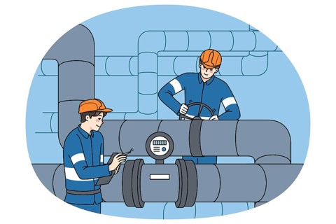 Male workers in uniform inspect and maintain water tubes and pipes. Mechanics control pipeline