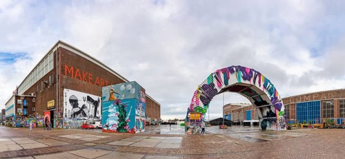 A picture of the STRAAT Museum's building and nearby art installations