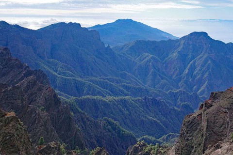Rugged mountains stretch out under a cloudy sky, Caldera de Taburiente, Roques de los Muchachos, La