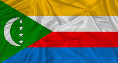 Realistic flag of Comoros waving in the wind. Comoros flag with Texture Waving in the wind