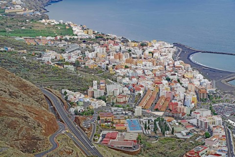Coastal town with colourful houses situated between mountains and sea, Santa Cruz de la palma, no