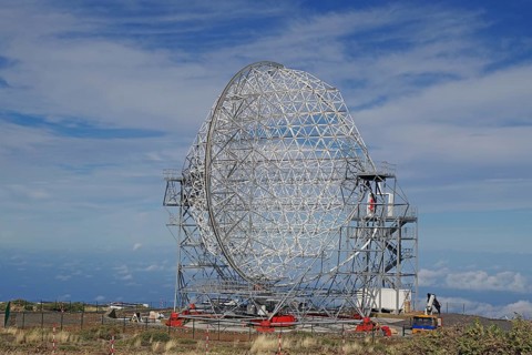 A large telescope with a metal structure under a blue sky, no light pollution, Observatory, Roques
