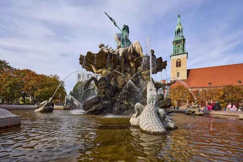 Neptune Fountain and St Mary's Church in Berlin, capital city, independent city, federal state of