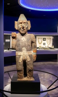 Stone carved figure of Centzonhuitzuahuah, deity of pulque, archaeological site and museum of