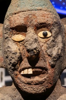 Stone carved face of Centzonhuitzuahuah, deity of pulque, archaeological site and museum of Templo