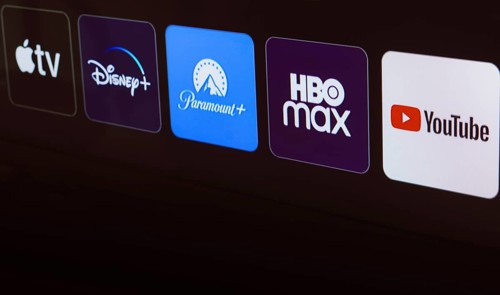 In this photo illustration the Apple TV, Disney Plus, Paramount Plus, HBO Max and YouTube logo is