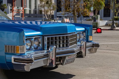 A picture of the front side of a light blue Cadillac Eldorado