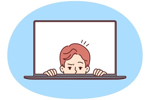 Man with frightened face looks out of laptop screen for concept of non-professional work on