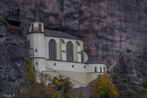 An old half-timbered town in autumn. A church was built into a rock here. Unique German