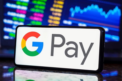 In this photo illustration, the Google Pay logo is displayed on a smartphone screen