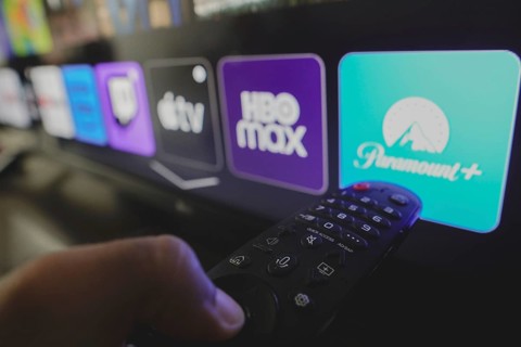 In this photo illustration the Paramount Plus, HBO Max and Apple TV logo is displayed on a TV