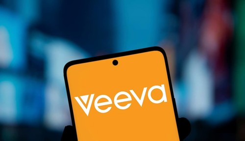 Veeva Systems logo is displayed on smartphone. Veeva Systems Inc is an American cloud computing