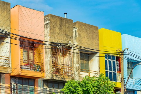 Colorful shabby old and dirty apartments in Don Mueang Bangkok Thailand