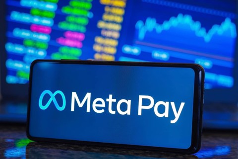 In this photo illustration, the Meta Pay logo is displayed on a smartphone screen