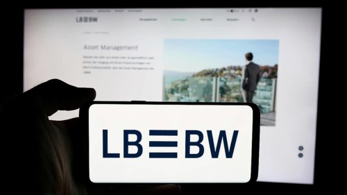 Stuttgart, Germany, 07-15-2024: Person holding cellphone with logo of German company Landesbank