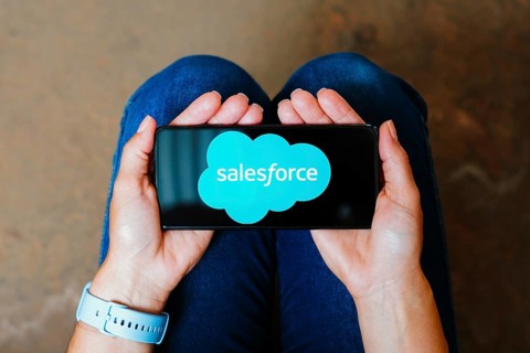In this photo illustration, the Salesforce logo is displayed on a smartphone screen