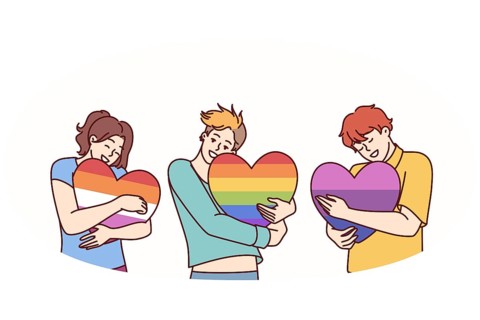 People hugging hearts painted in colors of LGBT and LGBTQ flags making freedom of choice in sex and
