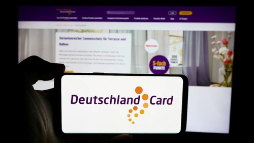 Stuttgart, Germany, 07-15-2024: Person holding cellphone with logo of German customer loyalty