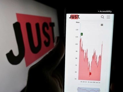 Stuttgart, Germany, 03-23-2024: Person holding cellphone with website of British financial services