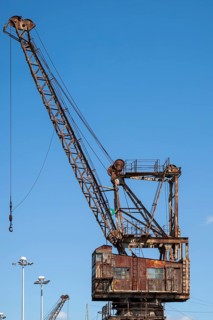 CHATHAM, KENT, UK, AUGUST 9. View of an old dockyard crane in Chatham, Kent, UK on August 09, 2024
