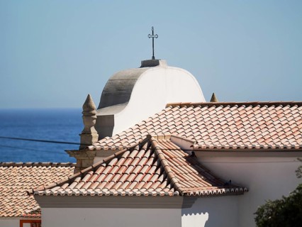 Mother Church with Ocean in the background in Albufeira, Algarve, Portugal, Europe