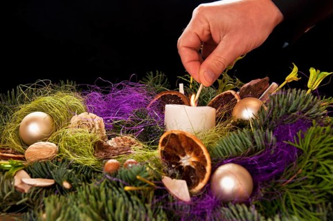 Christmas floral table decoration withe hand and match