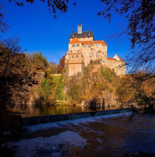 Kriebstein Castle rises on a steep rock above the Zschopau. Within the large group of hilltop