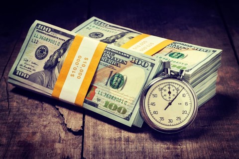 Time is money loan concept background. Vintage retro effect filtered hipster style image of