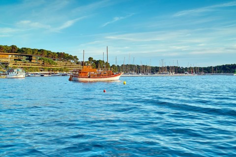 Boats in Rovinj harbour, sea, blue sky, Istria, Croatia, Europe